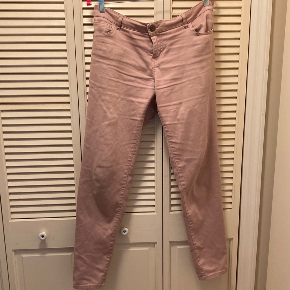 Blush colored skinny jeans